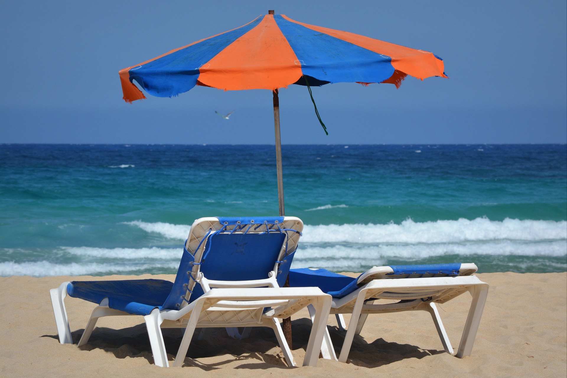 Umbrellas and deck chairs at the beach